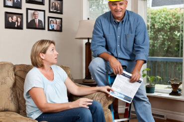explaining roofing cost to a homeowner